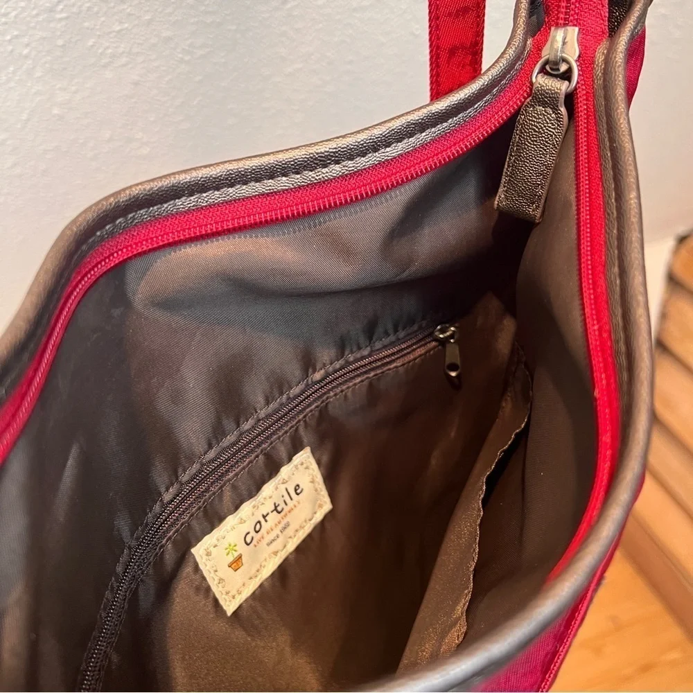 CORTILE FABRIC BACKPACK. Adj Straps. Front Flap Pocket w/snap & zipper pocket